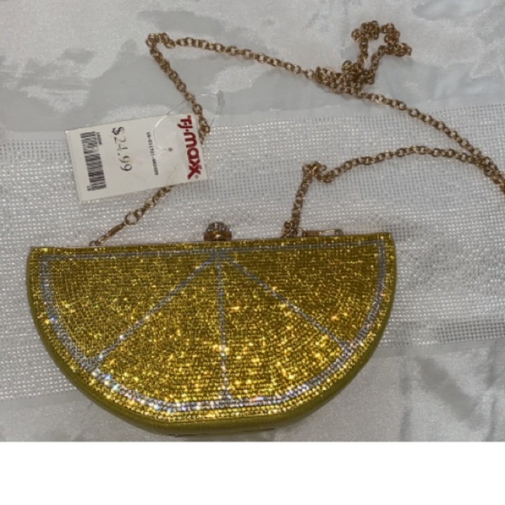 A rhinestone lemon clutch